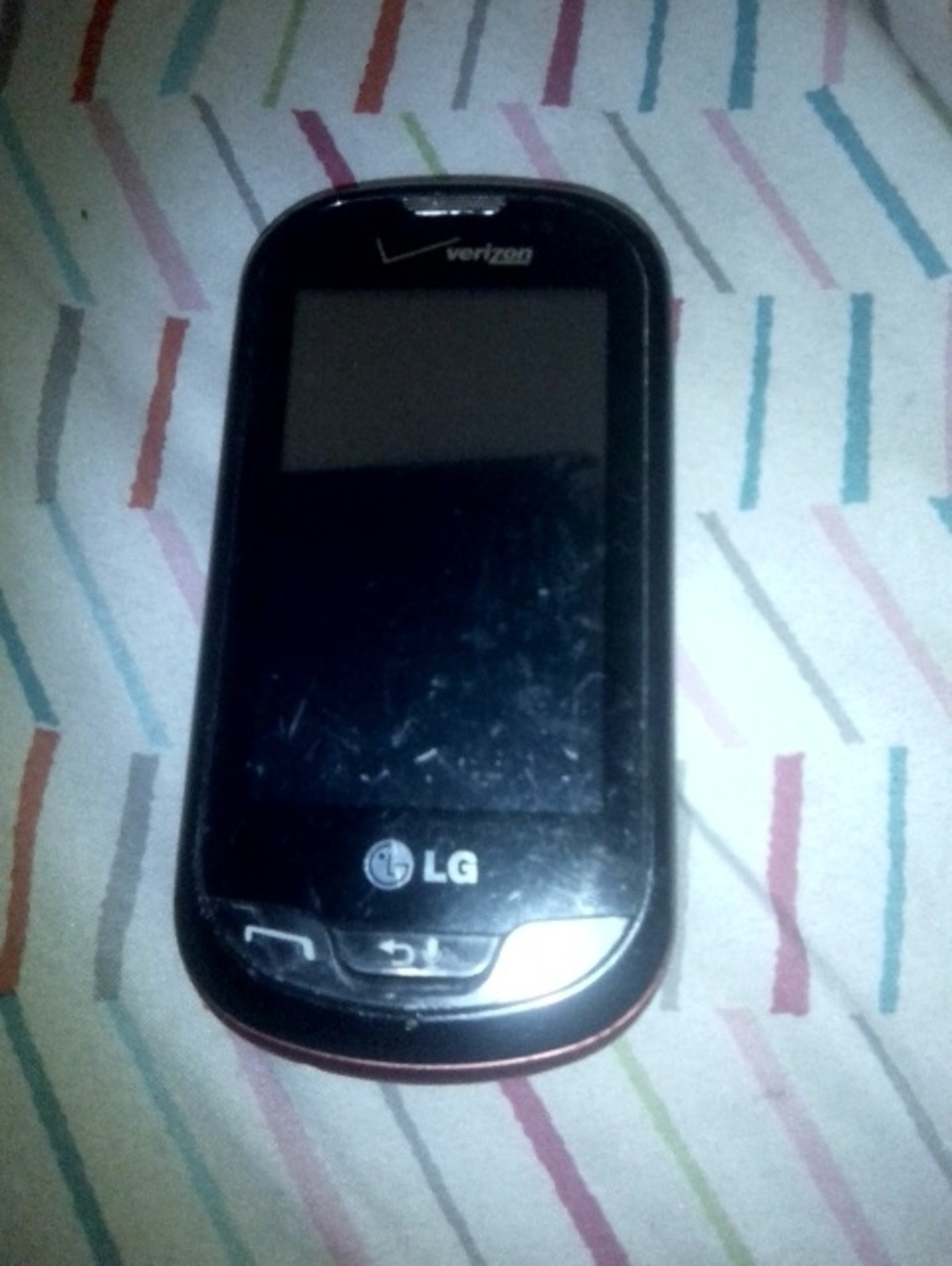 LG Black Touchscreen Cell Phone with Verizon Logo